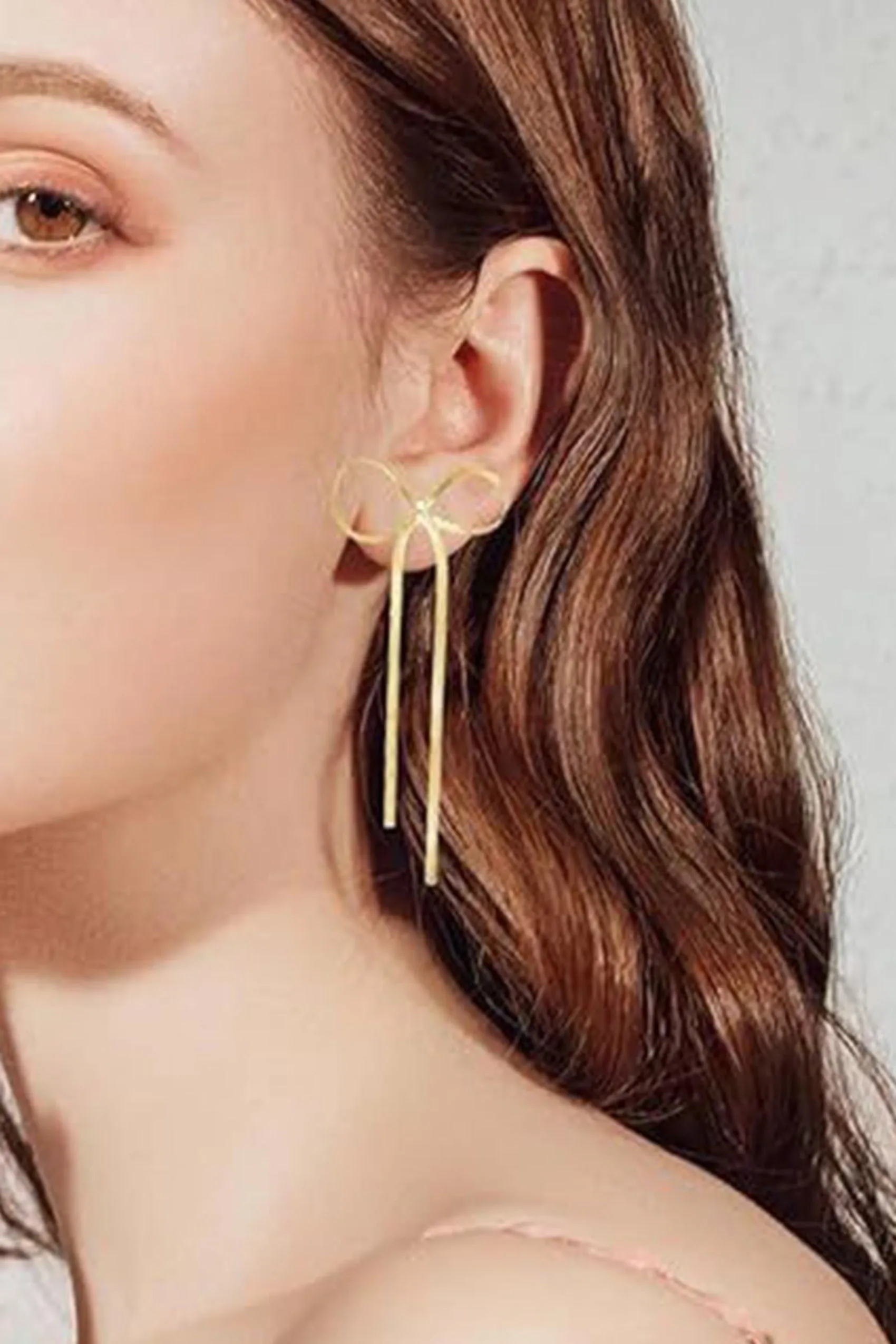 Gold Bow Tassel Earrings